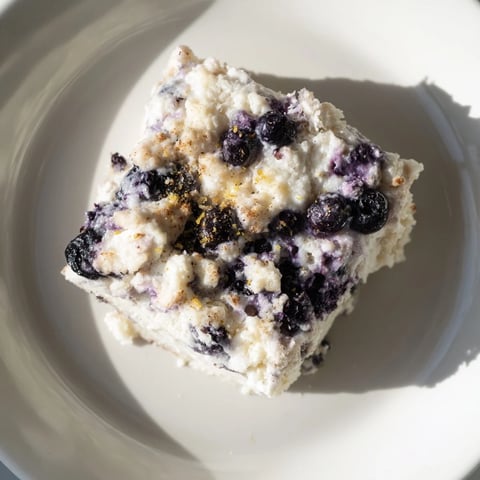 Golden, bubbly Blueberry Cottage Cheese Bake, served warm with a creamy, protein-packed texture.