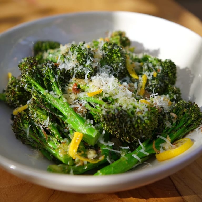 Enjoy a plate of vibrant Simple Garlic and Parmesan Roasted Broccoli, perfect as a quick, flavorful side.